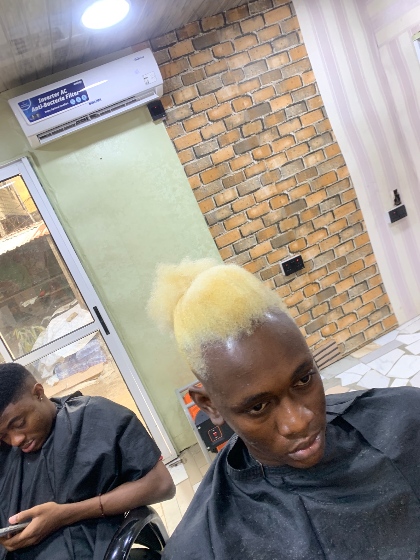 Blonde high-top with skin fade